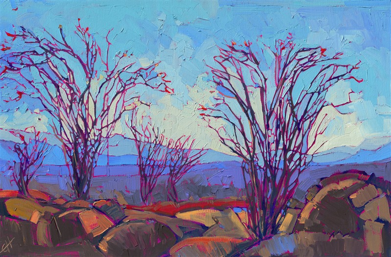 Borrego Springs proudly presents its blooming ocotillos, their tall spider stalks bending under the weight of their heavy red flowers. The distant mountains appear clear and blue in the dry desert atmosphere. This painting is created with thick, impasto brush strokes that create a mosaic of color and texture.