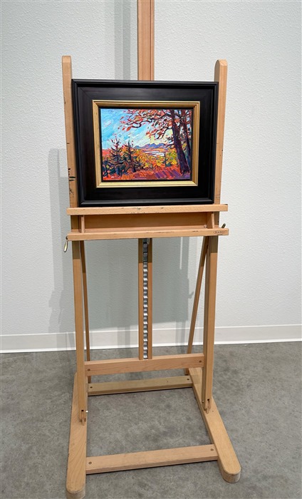 A petite canvas captures the wide landscape and vivid fall colors of the Blue Ridge Mountains in North Carolina. Blue Ridge Parkway is the most-traveled highway in the U.S., as leaf peepers from far and wide gather to see the brilliant fall foliage.</p><p>"Blue Ridge Vista" is an original oil painting on linen board. The piece arrives framed in a classic black and gold plein air frame, ready to hang.