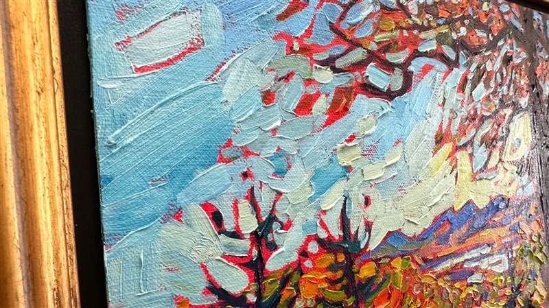 A petite canvas captures the wide landscape and vivid fall colors of the Blue Ridge Mountains in North Carolina. Blue Ridge Parkway is the most-traveled highway in the U.S., as leaf peepers from far and wide gather to see the brilliant fall foliage.</p><p>"Blue Ridge Vista" is an original oil painting on linen board. The piece arrives framed in a classic black and gold plein air frame, ready to hang.