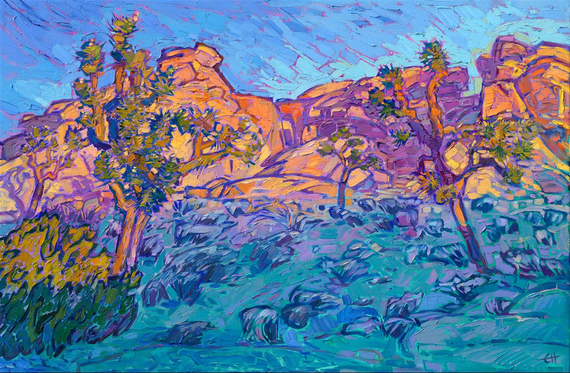 The windy, high desert of Joshua Tree National Park is most beautiful at dawn and sunset. The crystalline granite boulders reflect and refract the colorful light, turning rainbow hues of orange, yellow, purple, and blue. This painting captures the sunset glow highlighting a group of boulders and Joshua trees, while the foreground fades into twilight.